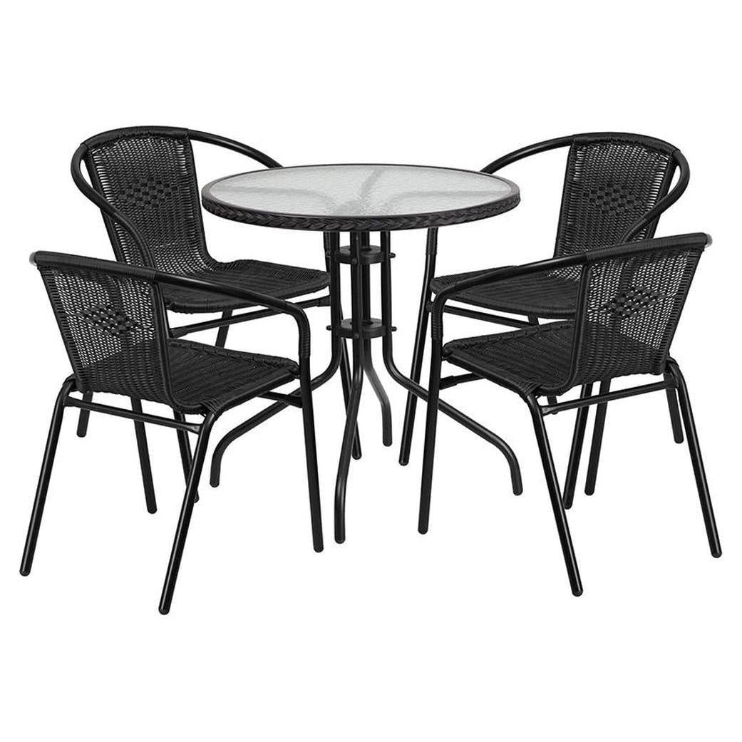 Ensemble table ronde Ø 71 cm avec plateau en verre et 4 chaises empilables en résine tressée
