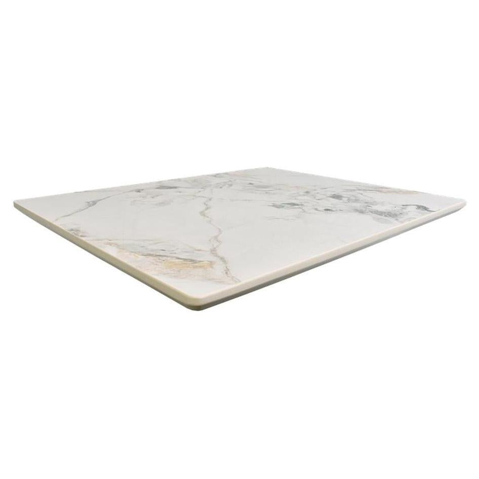 Tabletop made of sintered stone with bright white marble pattern
