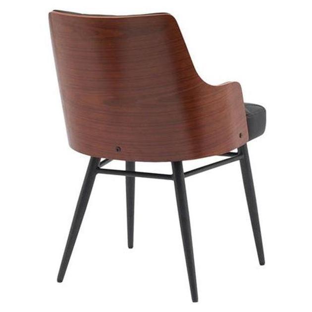 Chaise interior de metal estilo mediados de siglo, tapizada en cuero sintético con respaldo capitoné.